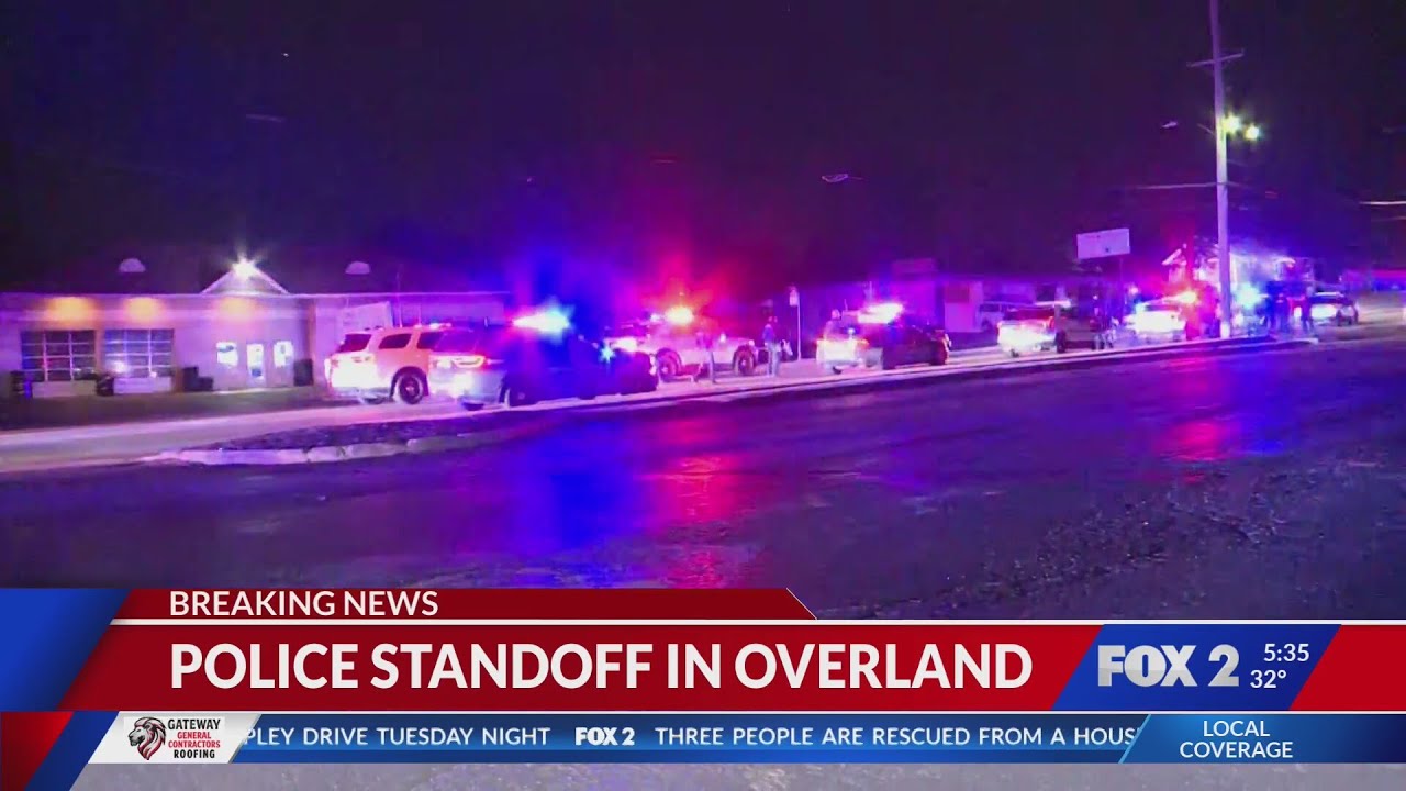 Police in overnight standoff with barricaded person in Overland - YouTube
