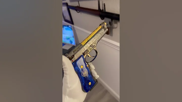 Beretta 92 fully engraved with 24k gold plated accents and custom grips. 9mm