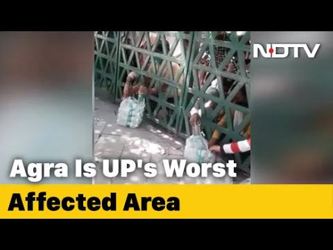 Hands Reach For Water, Biscuits From Shut Gates At Agra Quarantine Unit