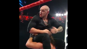 Seth Rollins put baron Corbin through the table ll #wwe #shortsfeed #ytshorts