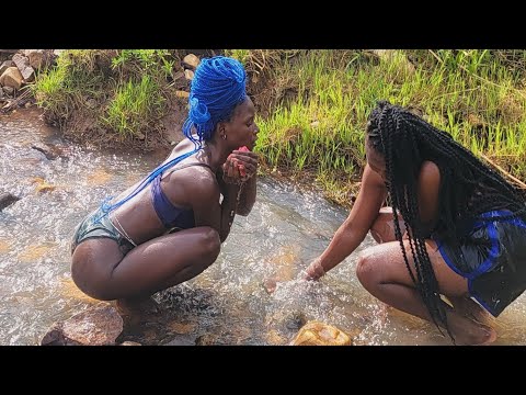 African girls  taking  bath in the river @DeeMwango