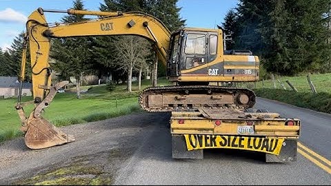 HOW TO SIDE LOAD AN EXCAVATOR ON A LOWBOY TRAILER