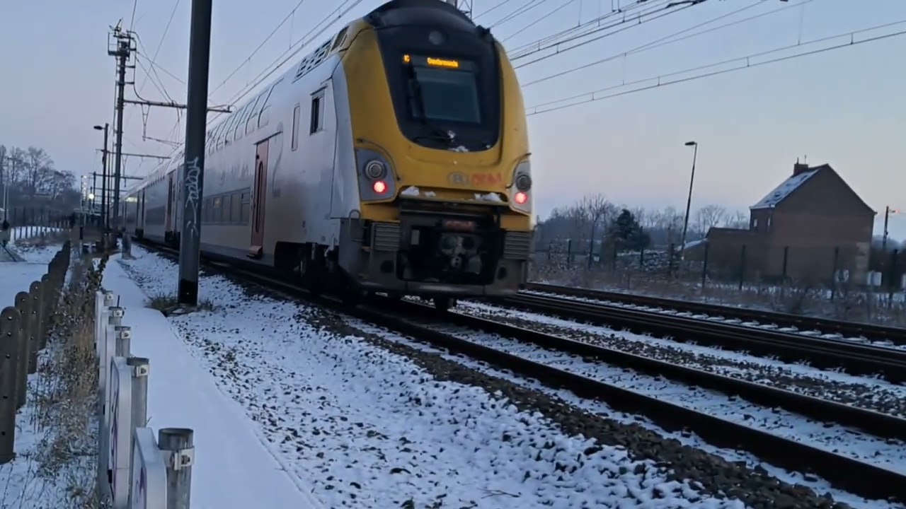 Frozen Froyennes station in beautiful late afternoon light.  SNCB M7 BMX and AM96 on 5th December