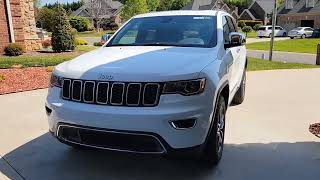 I Program the 2022 Jeep Grand Cherokee Homelink System to my Parents Home Garage Door