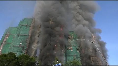 Death toll rises to 128 in Hong Kong residential fire as 8 more arrested over towers' renovation