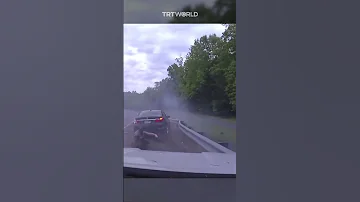 Police Officer Barely Escapes High Speed Car Crash 