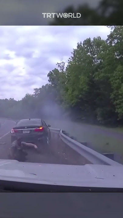 Police officer barely escapes high-speed car crash