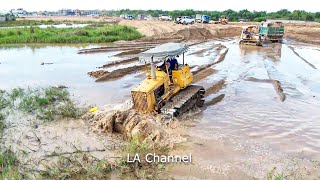 Outstanding Operator Push Clearing Sand In Water To Fill Four Mini Bulldozers With Sand
