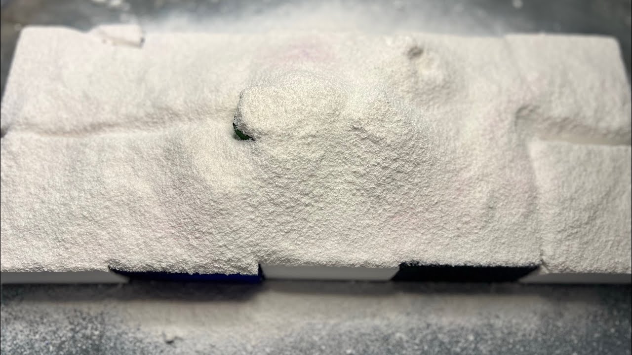 Fresh dyed soft blocks and plain soft blocks covered in gym chalk powder