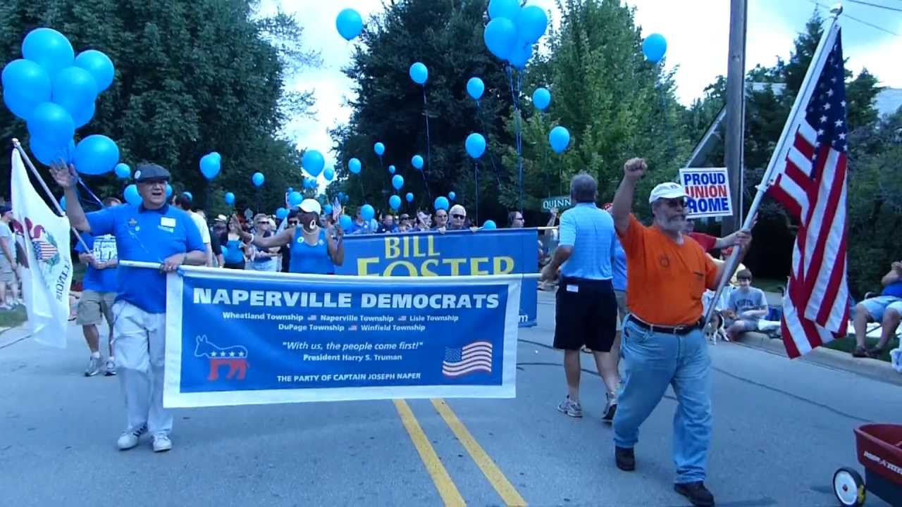 Naperville, Ill. Democrats walk along the Naperville Labor Day parade