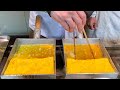 japanese street food -  TAMAGOYAKI rolled omelette  玉子焼き