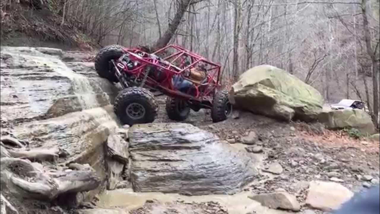 Jim Simpson in his 6.0 buggy on a waterfall at Black Mountain Offroad