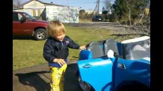 Mini Cooper Jeep Power Wheels Klein playing on trailer 1-29-12.3gp