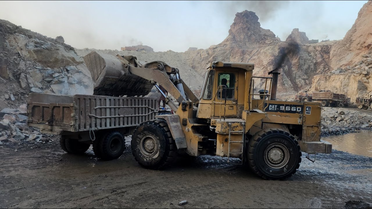Powerful Caterpillar 966D Wheel Loader Roaring in Mountain Area ...