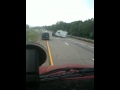 SUV pulling camper rolled over