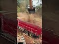 Excavators Load Soil Onto Trucks