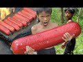 Primitive technology  eating delicious  cooking hot dogs on a rock