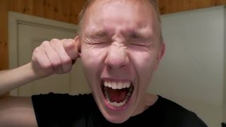 Miten Laittaa Peukalo Korvan Läpi