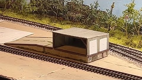 N scale switching layout update 15: unloading dock, bakery details, locomotives, and the mill.