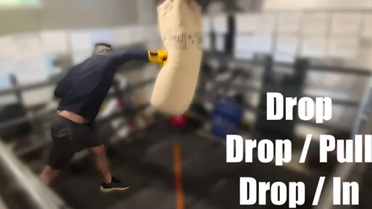 Heavy Bag Drill : Drop, Pull / Drop, + Rear Hand, Drop / In  + Lead Hand