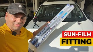 Sun control film installation in the car. GARWARE/IceCool Shield RTAapproved Film / TATA SAFARI