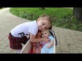 Кира гуляет с коляской и куклами, кормит и дает водичку/Kira walks with a stroller and dolls