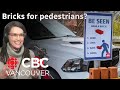 Here's the story behind that video of free bricks offered to Vancouver pedestrians