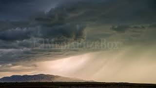 Full 8K Stock Video - Rainstorm following dark clouds rolling through the sky in Utah Valley Guide