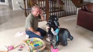 Grandson in Darth Vader helmet fun times