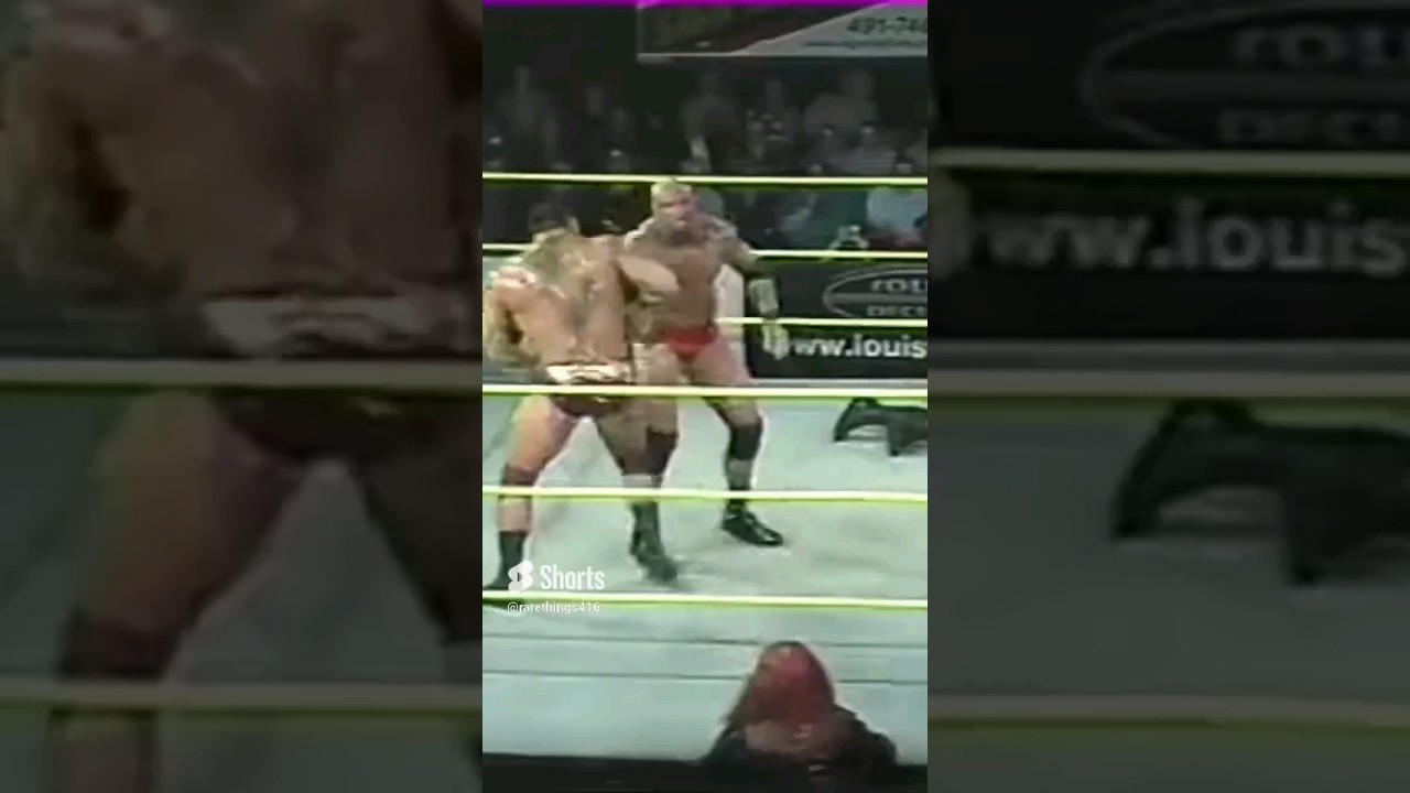 Batista destroy Tyson Tomko by Massive Clothesline and Some Punches