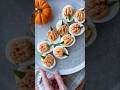 Full recipe for these pumpkin shaped deviled eggs on thechicishchick.com #fallrecipes #fallfood