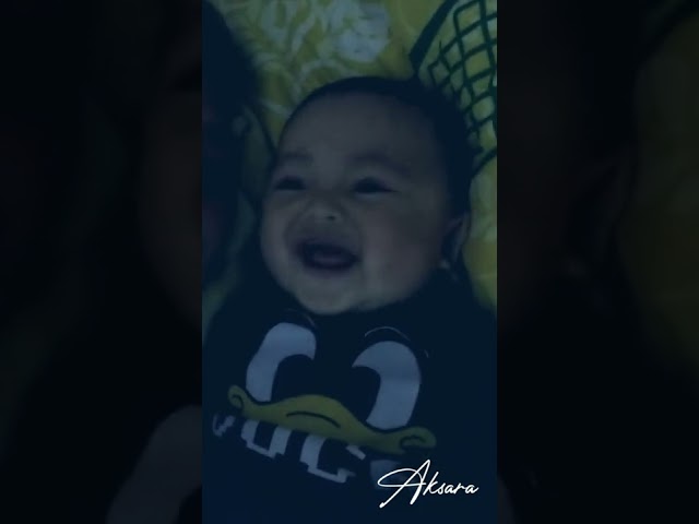 baby boy laughing out loud class=