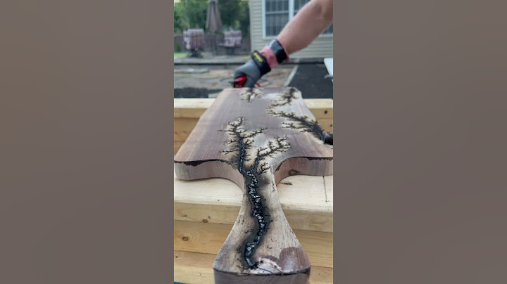 Fractal wood burning a custom ordered black walnut charcuterie board!