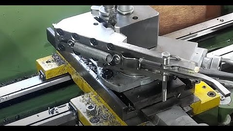 Auto Retracting Thread Cutter.