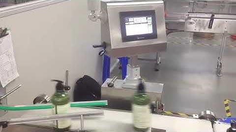 Checkweigher machine to check whether the shampoo weight is qualified.