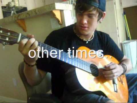 Tyler with guitar.