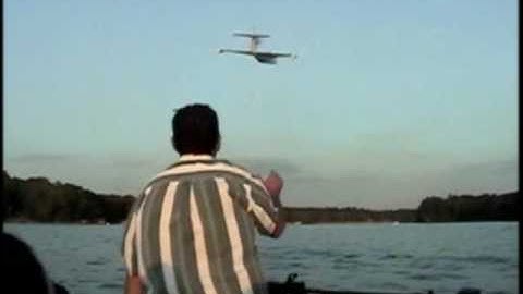 2 Polaris Seaplanes attempting to fly formation from a moving boat.