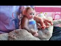 Mom Cleaning Baby Chaly's Nails.