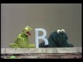 Sesame Street Kermit Shows The Letter B To Cookie Monster Sesame Street Kermit Shows The Letter B To Cookie Monster