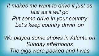 Travis Tritt - Put Some Drive In Your Country Lyrics