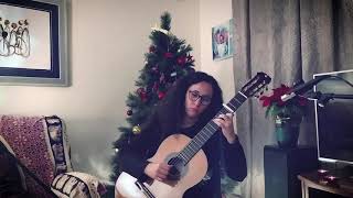 PDF Sample Christmas sand guitar tab & chords by Carolina Díez.