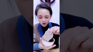 Mooncake shortbread dipped in thick paste. Crunch asmr
