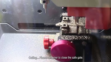 How to cut a Peugeot car key   HU83 by brand operate with touch screen