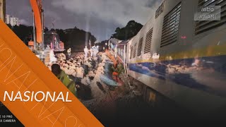 Keretapi tergelincir: Tanah mendap, keretapi tergelincir dari landasan
