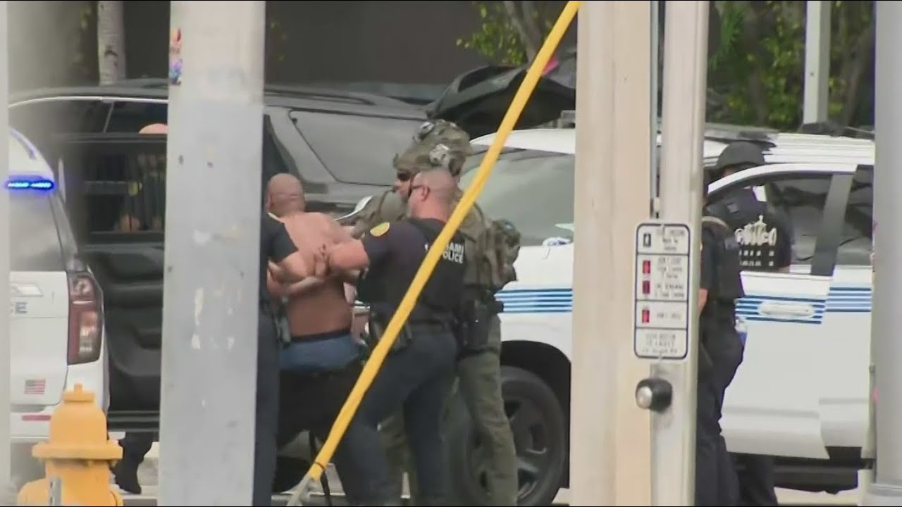 Man in custody after barricading himself inside SUV at Miami gas ...