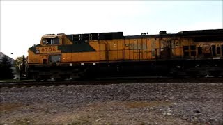 UP 6706 a patched CNW engine with NS power leads MSENP west through Elburn IL