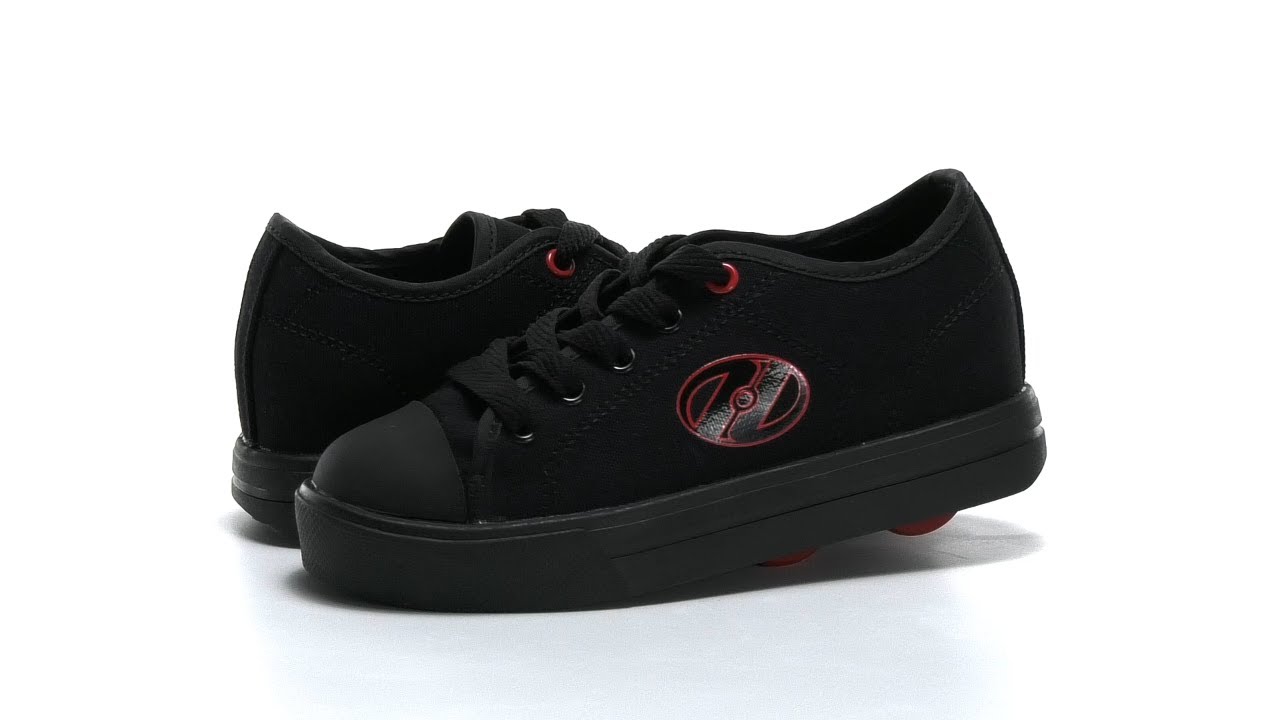 Heelys Hustle Noir/Blanc Chaussures à Roulettes