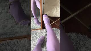 Legs in purple pantyhose on the carpet. #stockings #legs #foot