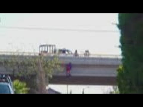 GRAPHIC Bodies hang from bridge as cartel violence escalates