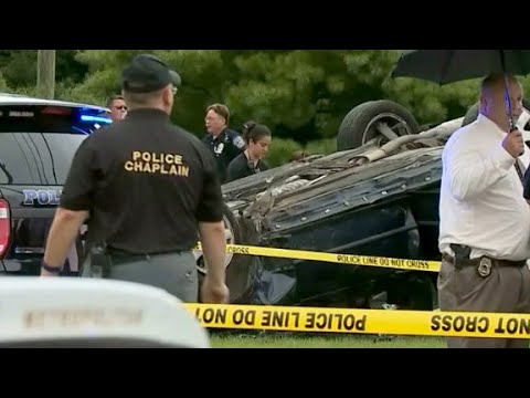 Driver charged with killing cop after crash - Driver charged with killing cop after crash